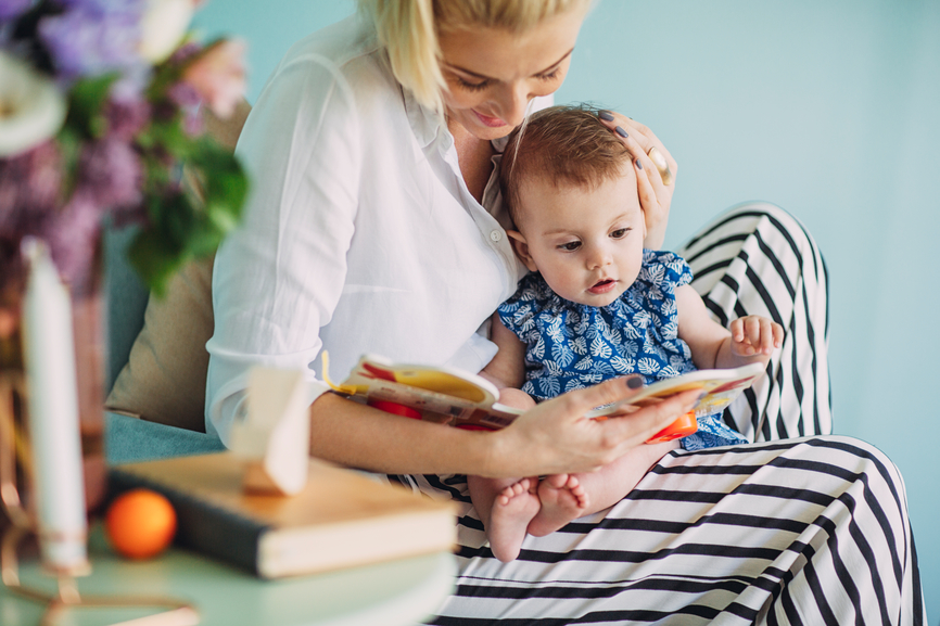 hooked-on-books-5-reasons-to-read-to-your-baby_mom-reading-to-intrigued-baby